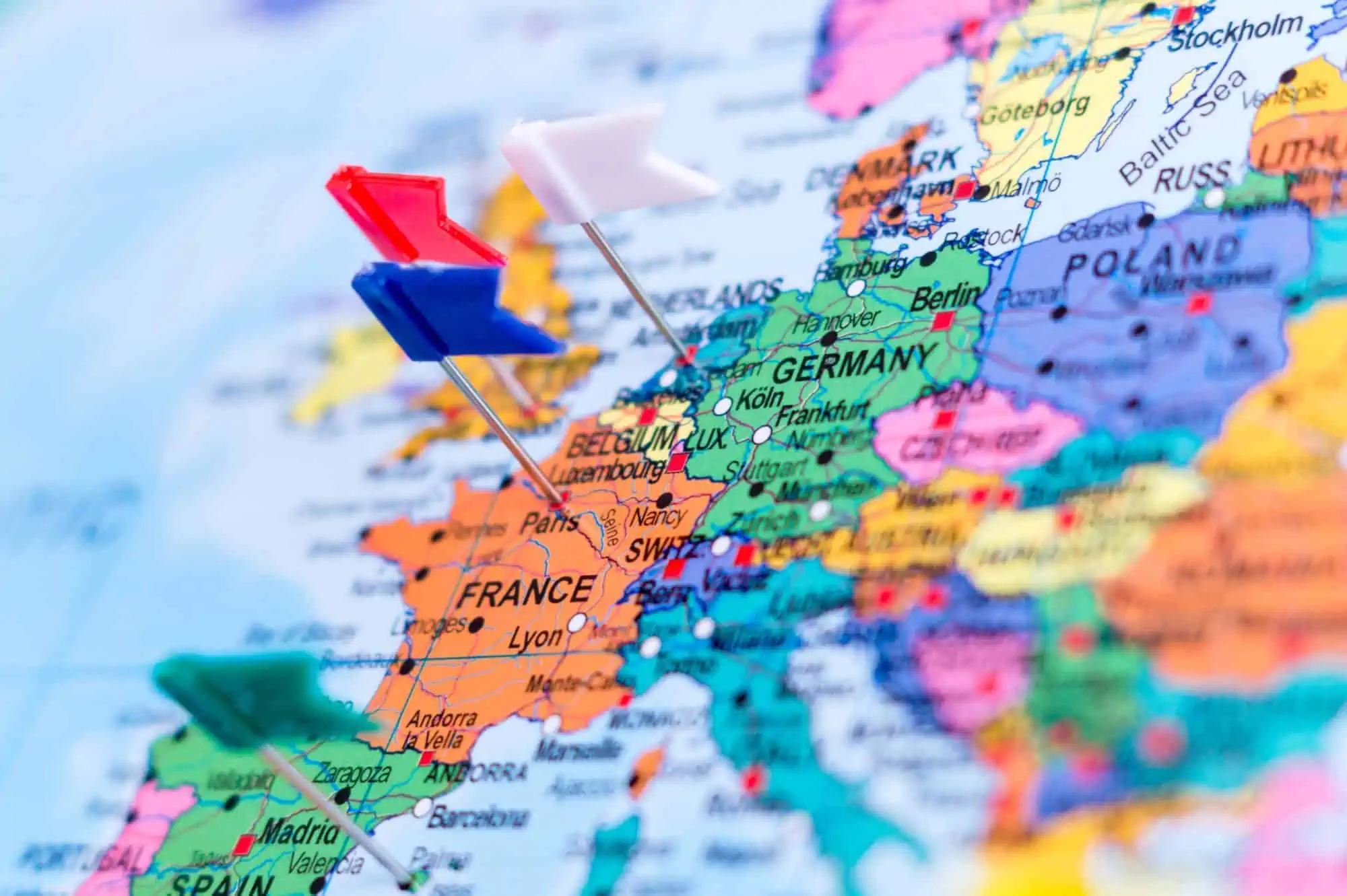 colorful map of europe with pushpins marking destinations
