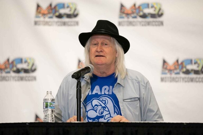Charles Martinet the voice of Mario speaking during a gaming convention.